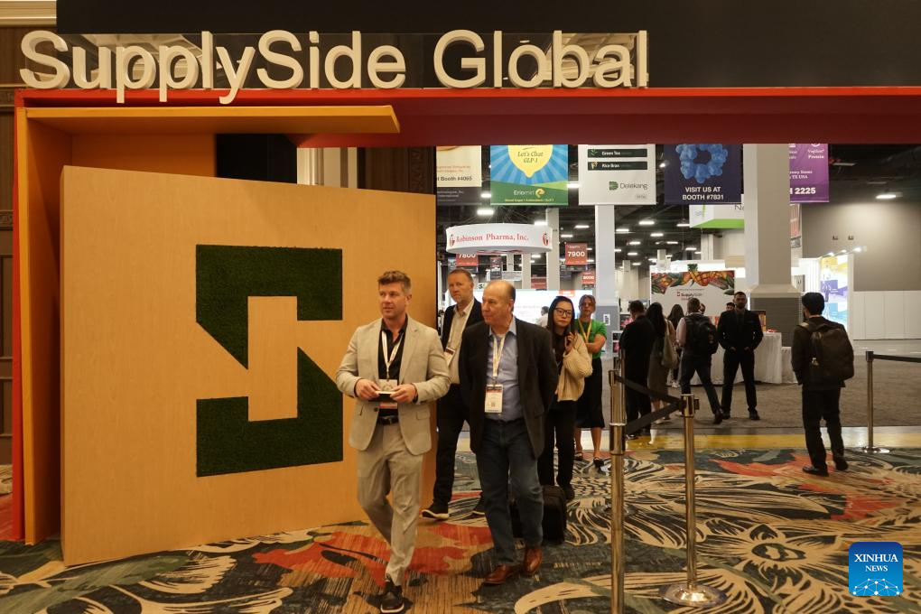 People visit the expo hall of SupplySide Global, in Las Vegas, Nevada, the United States, on Oct. 29, 2025. The SupplySide Global, North America's leading dietary supplement event, opened its expo hall on Wednesday in Las Vegas, U.S. state of Nevada. The event has drawn more than 1,600 exhibitors and over 20,000 participants from around the world, representing dietary supplement, food and beverage, pet health and personal care industries. (Photo by Zeng Hui/Xinhua)