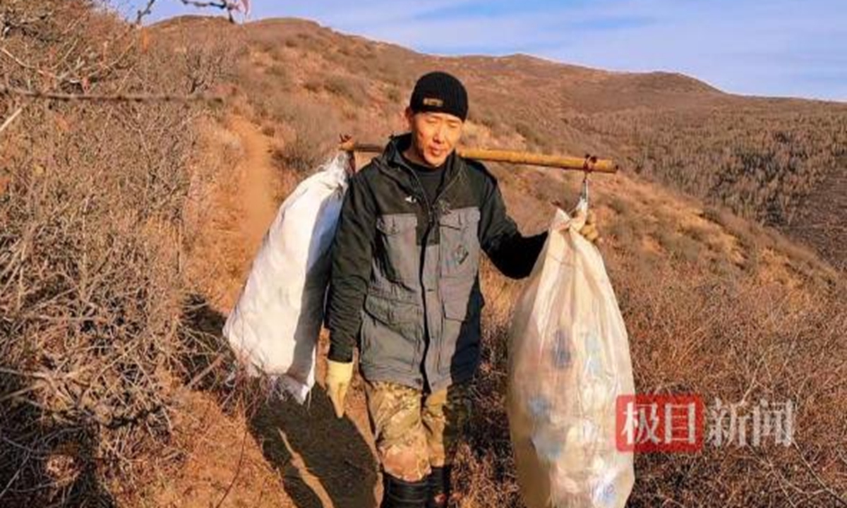 Hohhot man spends a decade cleaning mountains, collecting over 23,800 pounds of garbage