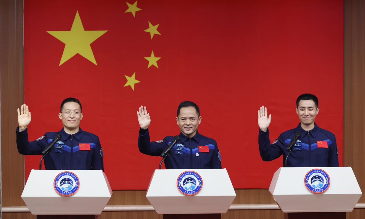 Chinese astronauts for the upcoming Shenzhou-21 spaceflight mission, Zhang Lu (center), Wu Fei (right) and Zhang Hongzhang meet the press at the Jiuquan Satellite Launch Center in Northwest China's Gansu Province on October 30, 2025. Photo: cnsphoto