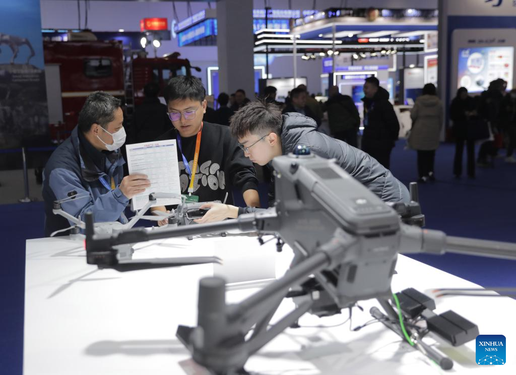 People visit the China International Emergency Management Exhibition (CIEME) at the China National Convention Center in Beijing, capital of China, Nov. 18, 2025. Kicked off here on Tuesday, the 3-day event boasted an exhibition area of about 40,000 square meters, with more than 300 exhibitors participating. (Xinhua/Guo Yu)