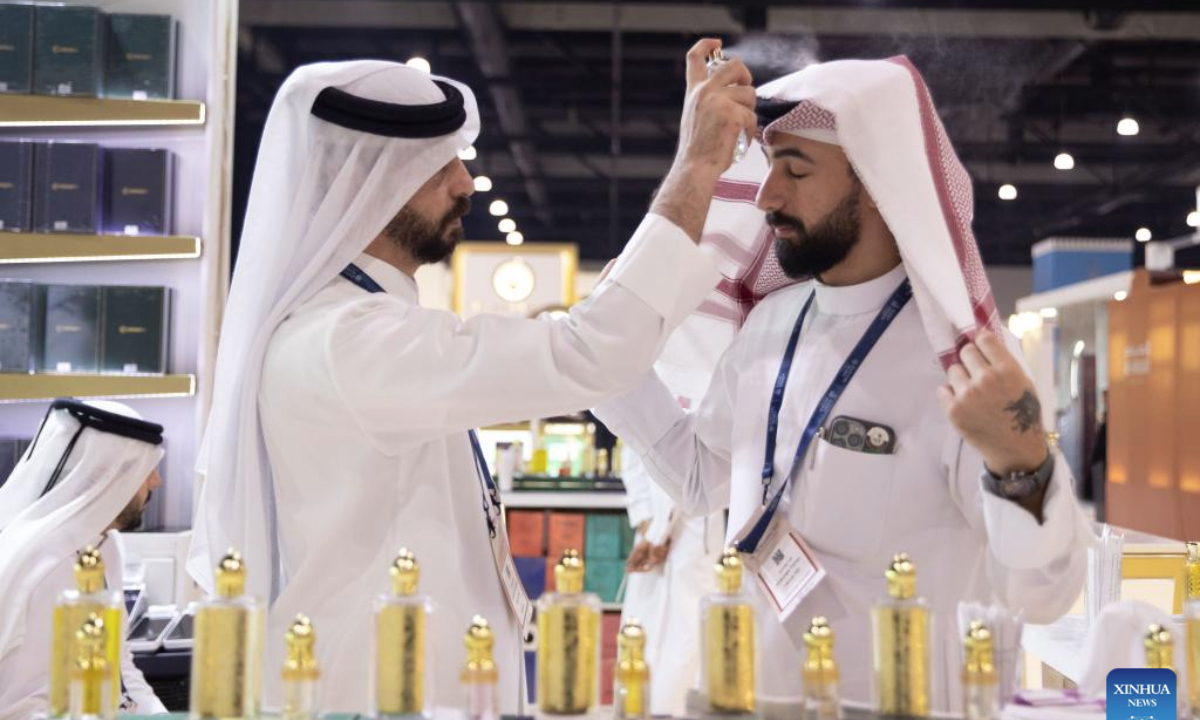 An exhibitor showcases Arabian incense at the Scent Arabia exhibition in Manama, Bahrain, Nov. 25, 2025. The Scent Arabia exhibition opened at Exhibition World Bahrain in Manama, Bahrain on Tuesday, featuring over 100 brands from the Gulf countries and worldwide, including perfumes, home fragrances and Arabian incense. The event is scheduled to run through Nov. 29. (Xinhua/Chen Junqing)