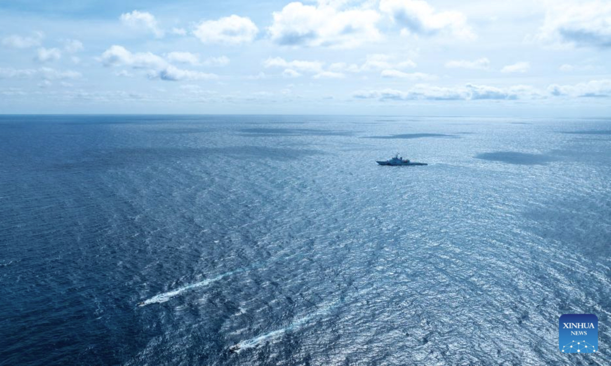 An aerial drone photo shows the China Coast Guard (CCG) patrolling in the territorial waters of China's Huangyan Dao and surrounding areas on Nov. 14, 2025. (Xinhua/Bei He)