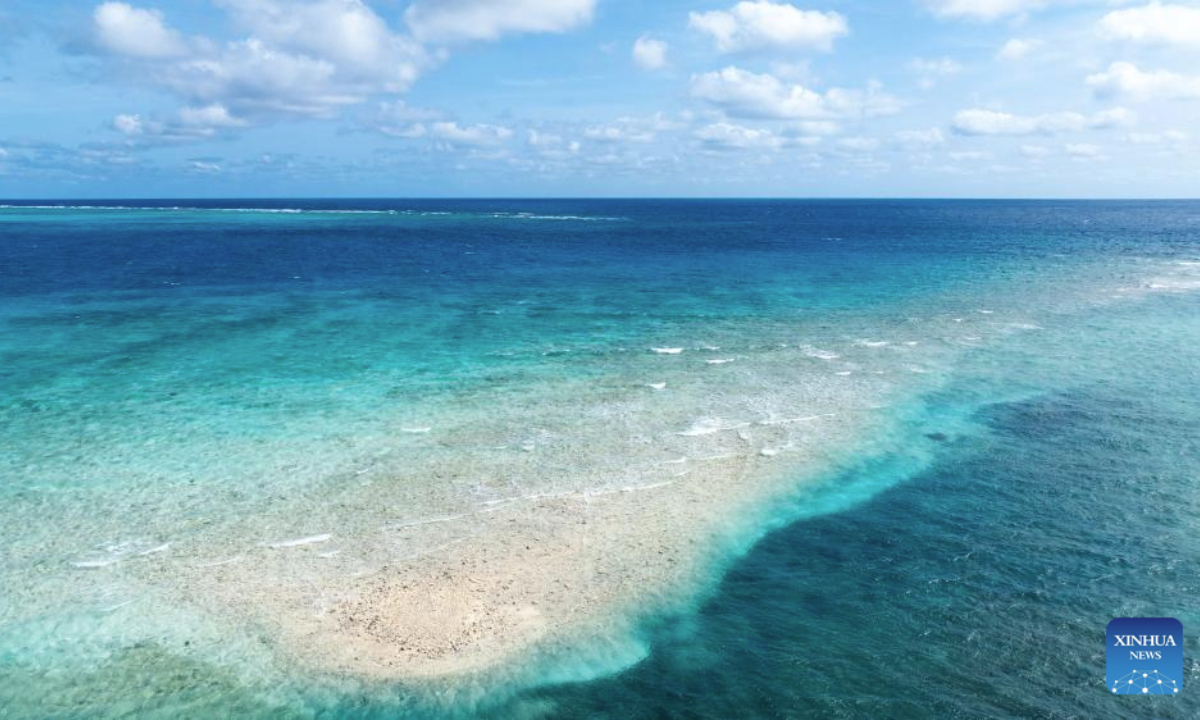 An aerial drone photo taken on Nov. 14, 2025 shows a panoramic view of China's Huangyan Dao in the South China Sea. Huangyan Dao is part of China's Zhongsha Qundao with diverse natural ecosystem. (Xinhua/Bei He)