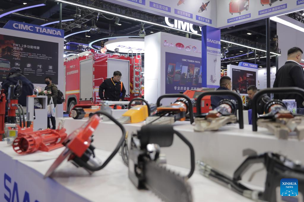 People visit the China International Emergency Management Exhibition (CIEME) at the China National Convention Center in Beijing, capital of China, Nov. 18, 2025. Kicked off here on Tuesday, the 3-day event boasted an exhibition area of about 40,000 square meters, with more than 300 exhibitors participating. (Xinhua/Guo Yu)