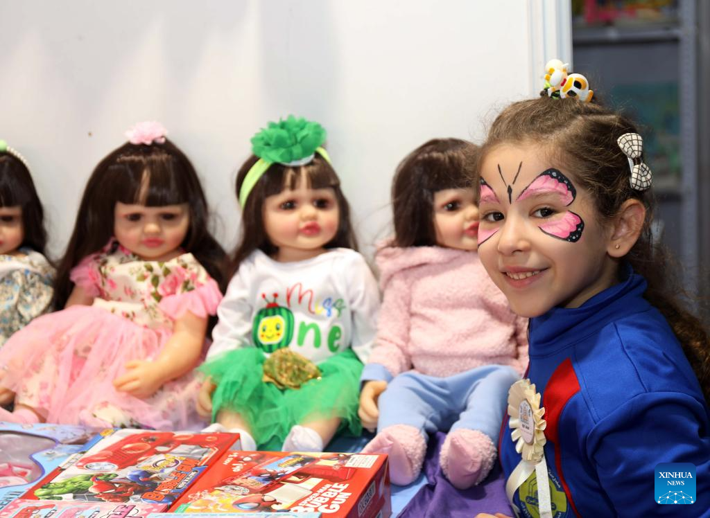 A girl enjoys herself during Iraq International Children's Festival in Baghdad, Iraq, Nov. 19, 2025. The forth edition of the Iraq International Children's Festival kicked off on Wednesday and will last 10 days. (Xinhua/Khalil Dawood)