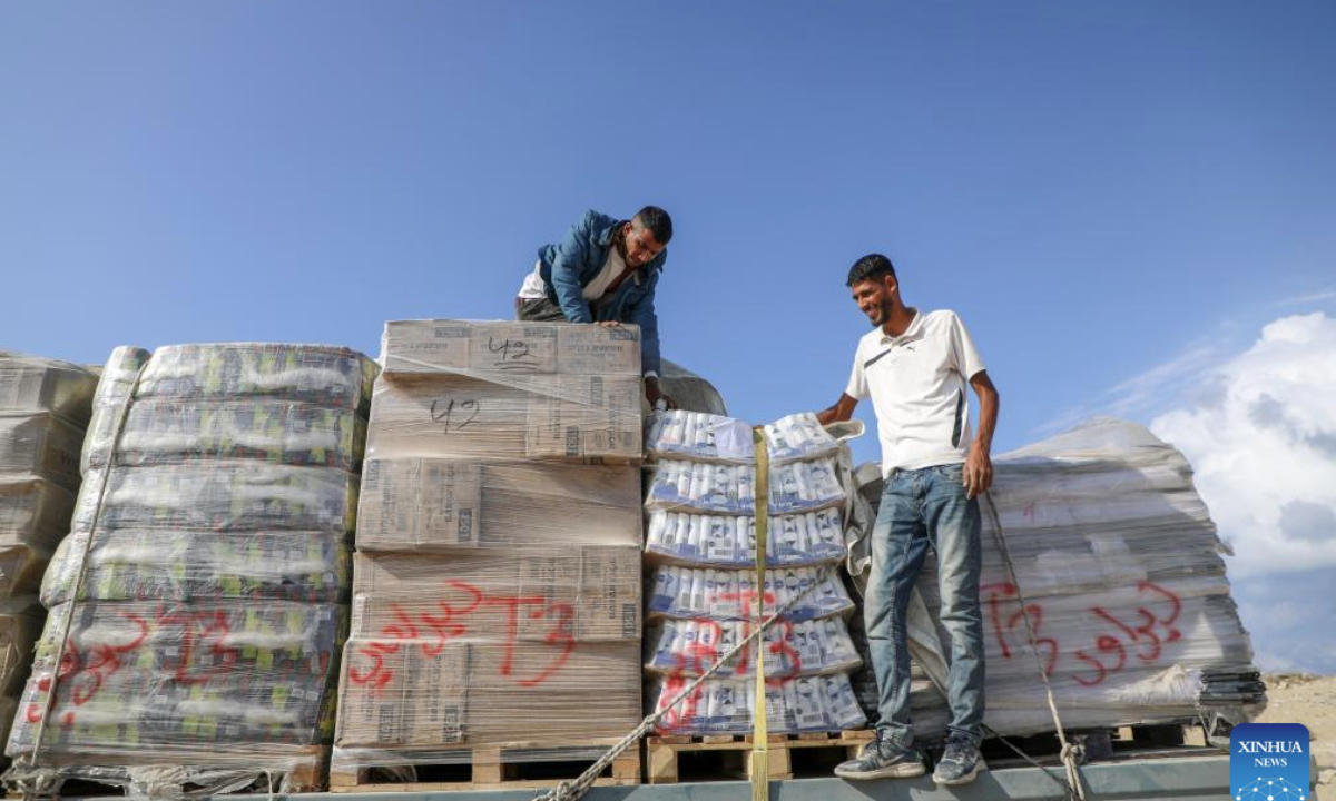 Photo taken on Nov. 13, 2025 shows commercial goods that has entered through the Zikim crossing in northern Gaza Strip. Israel said on Wednesday it has reopened the Zikim crossing to allow humanitarian aid trucks into northern Gaza. (Photo by Rizek Abdeljawad/Xinhua)