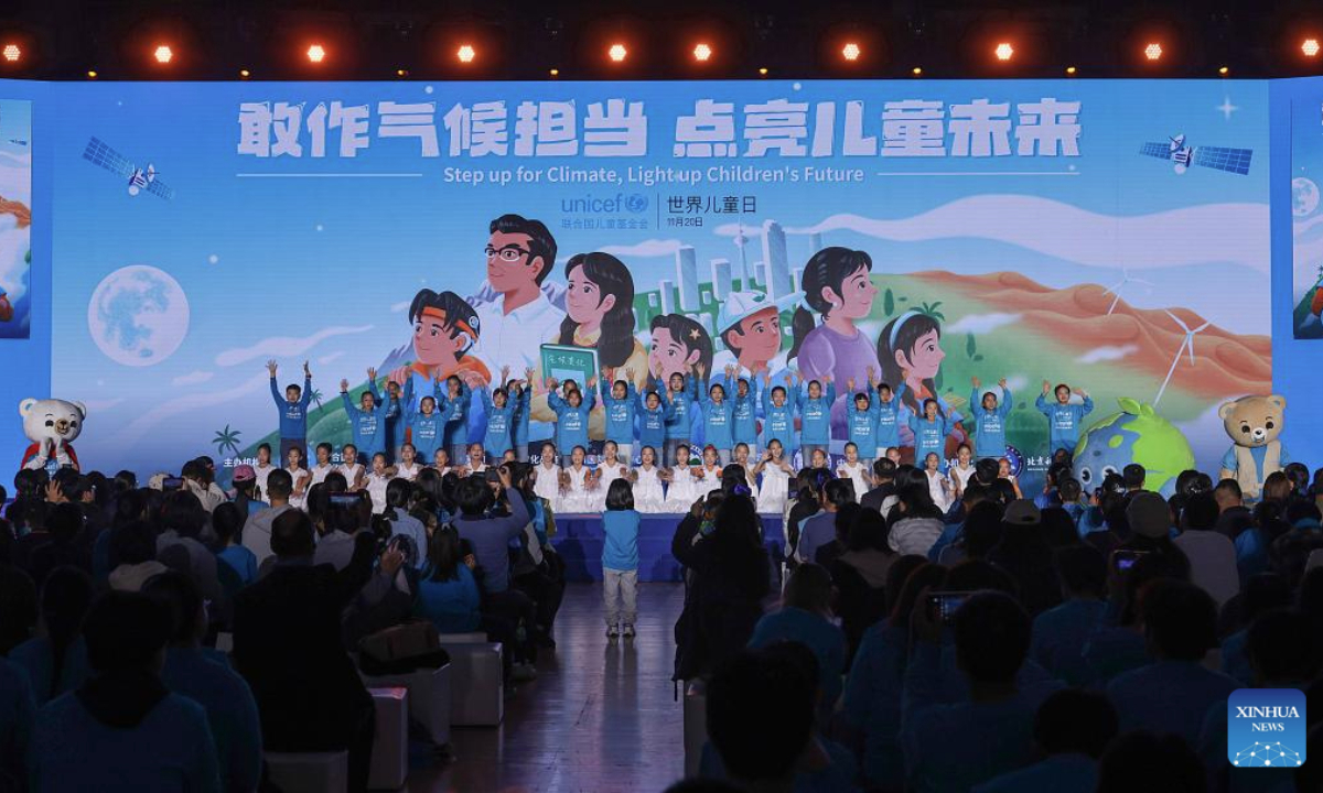 Children attend an event themed Step up for Climate, Light up Children's Future, held to mark World Children's Day, in Beijing, capital of China, Nov. 20, 2025. (Xinhua/Zhang Yuwei)