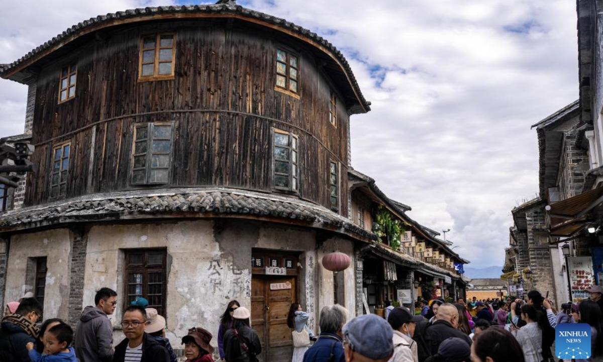 Tourists visit Xizhou old town in Dali City, southwest China's Yunnan Province, Nov. 24, 2025. (Xinhua/Hu Chao)