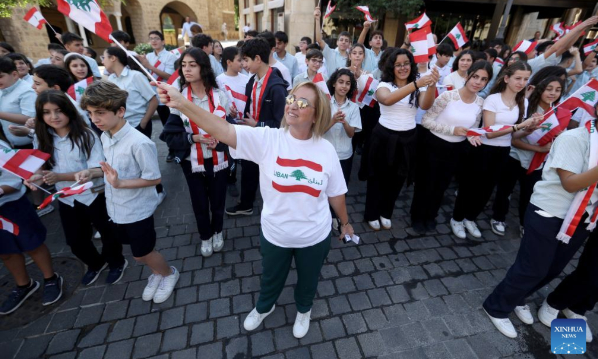 People participate in a celebration event for Lebanon's upcoming Independence Day in downtown Beirut, Lebanon, Nov. 20, 2025. Lebanon's Independence Day falls on Nov. 22. (Xinhua/Bilal Jawich)
