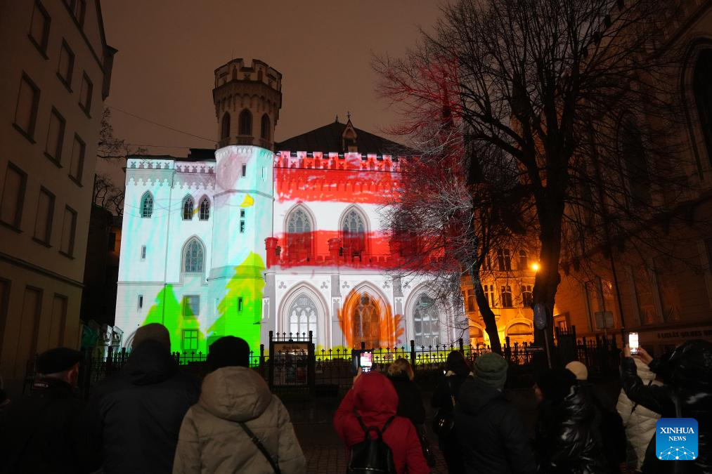 People view a light show at Small Guild house during the light festival Staro Riga 2025 in Riga, Latvia, Nov. 17, 2025. (Photo by Edijs Palens/Xinhua)