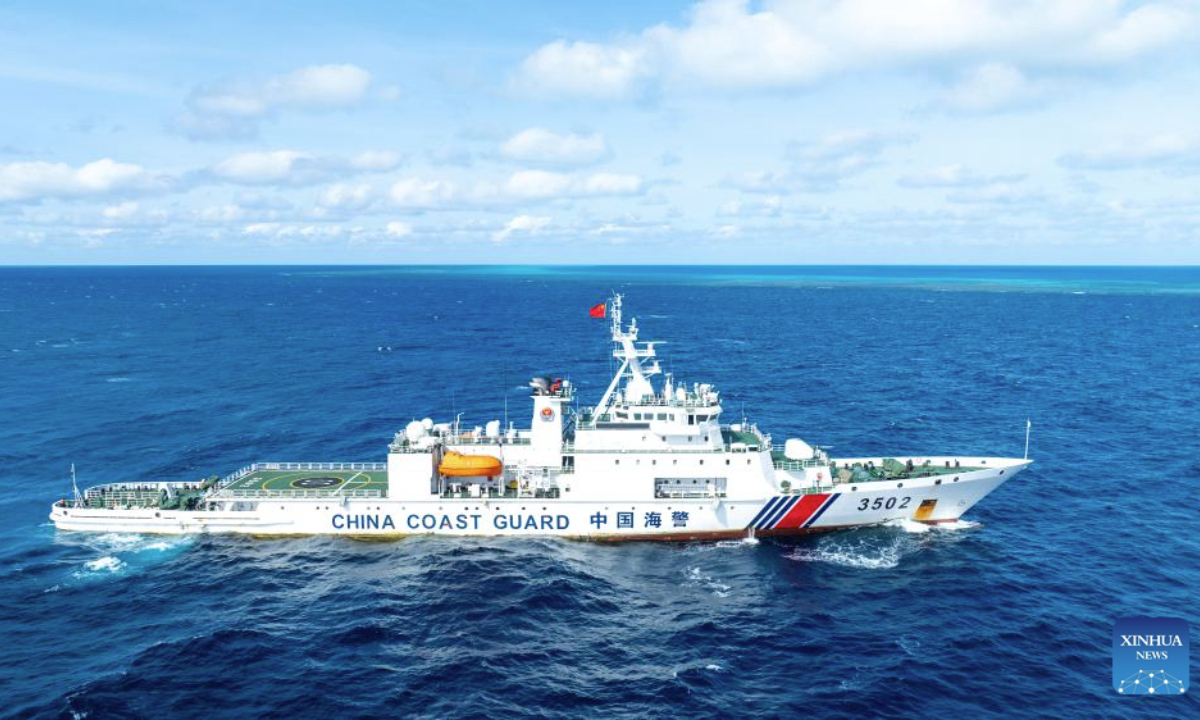An aerial drone photo shows the China Coast Guard (CCG) patrolling in the territorial waters of China's Huangyan Dao and surrounding areas on Nov. 14, 2025. (Xinhua/Bei He)