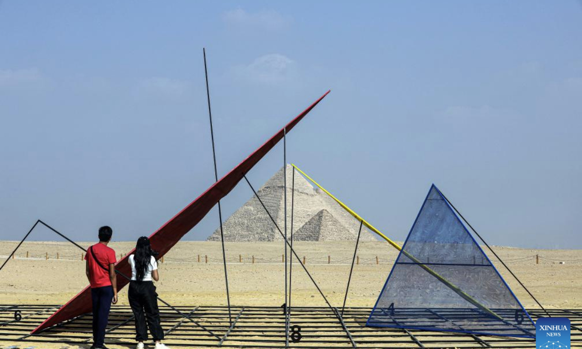 2025. The fifth edition of Forever Is Now international art exhibition on Tuesday kicked off in the area of Egypt's Giza Pyramids scenic spot, showcasing 10 artworks of artists from different countries. The exhibition runs from Nov. 11 to Dec. 6. (Xinhua/Ahmed Gomaa)