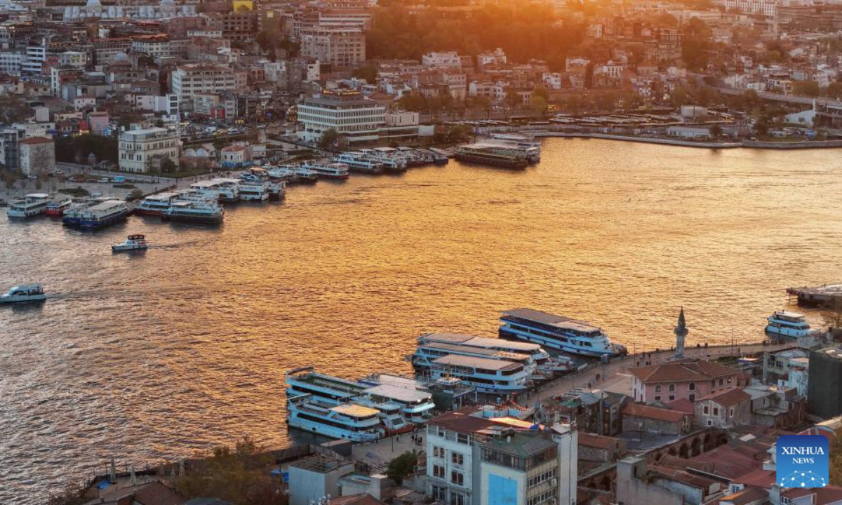 An aerial drone photo taken on Nov. 24, 2025 shows the Golden Horn at sunset in Istanbul, Türkiye. Located on the European side of Istanbul, the Golden Horn is one of the city's busiest natural harbors. (Xinhua/Liu Lei)