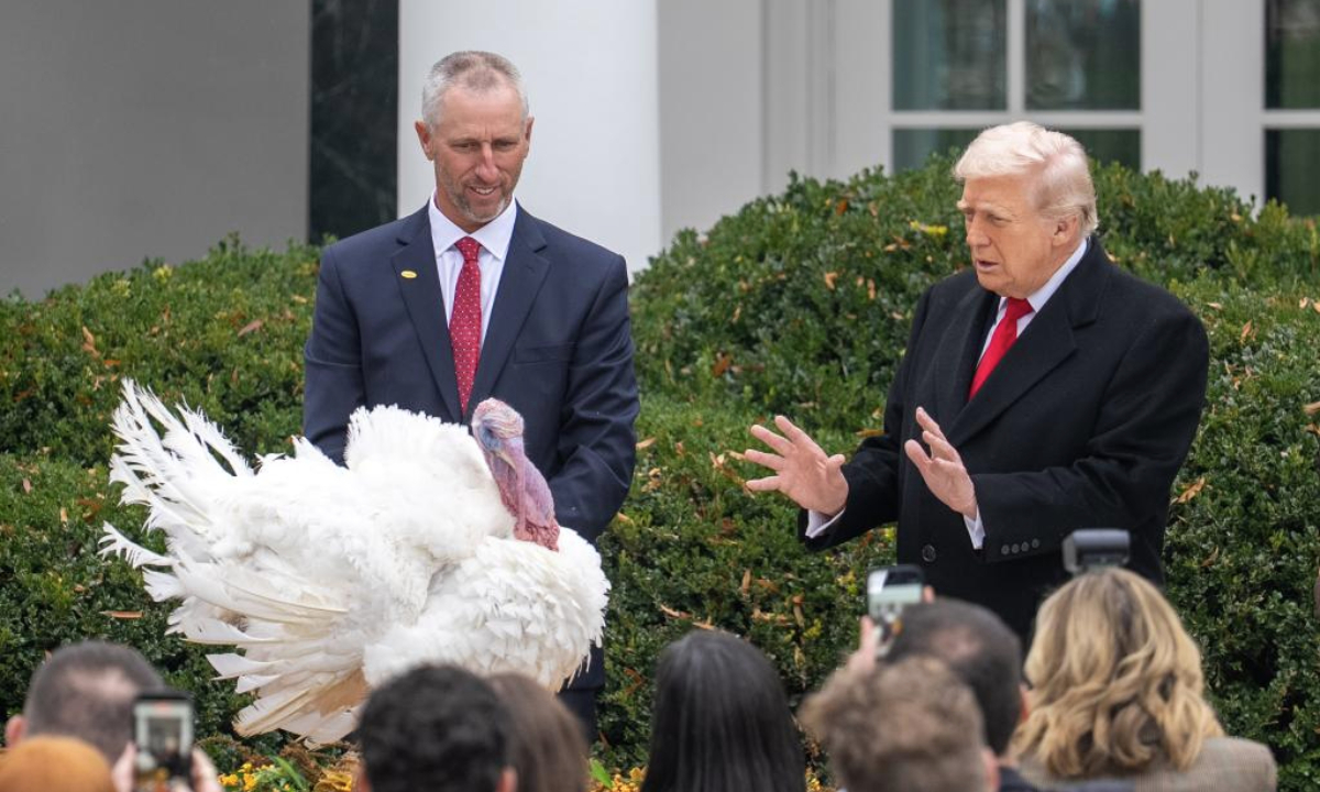 U.S. President Donald Trump (R) attends the National Thanksgiving Turkey Pardoning Ceremony at the White House in Washington, D.C., the United States, Nov. 25, 2025. (Xinhua/Hu Yousong)