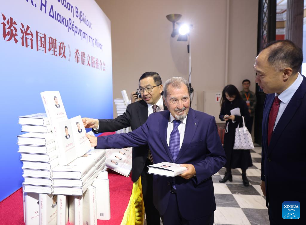 Ioannis Tragakis, chairman of the Greece-China Friendship Group in the Greek parliament, attends a launch ceremony for the Greek edition of Xi Jinping: The Governance of China in Athens, Greece, Nov. 18, 2025. (Photo by Lefteris Partsalis/Xinhua)