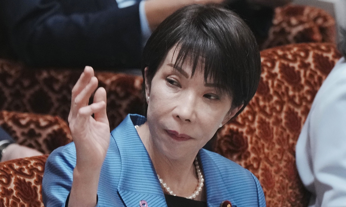 Japan's Prime Minister Sanae Takaichi raises her hand to answer a question during a session of the House of Councillors Budget Committee at the National Diet in Tokyo, Japan on November 12, 2025. Photo: VCG 