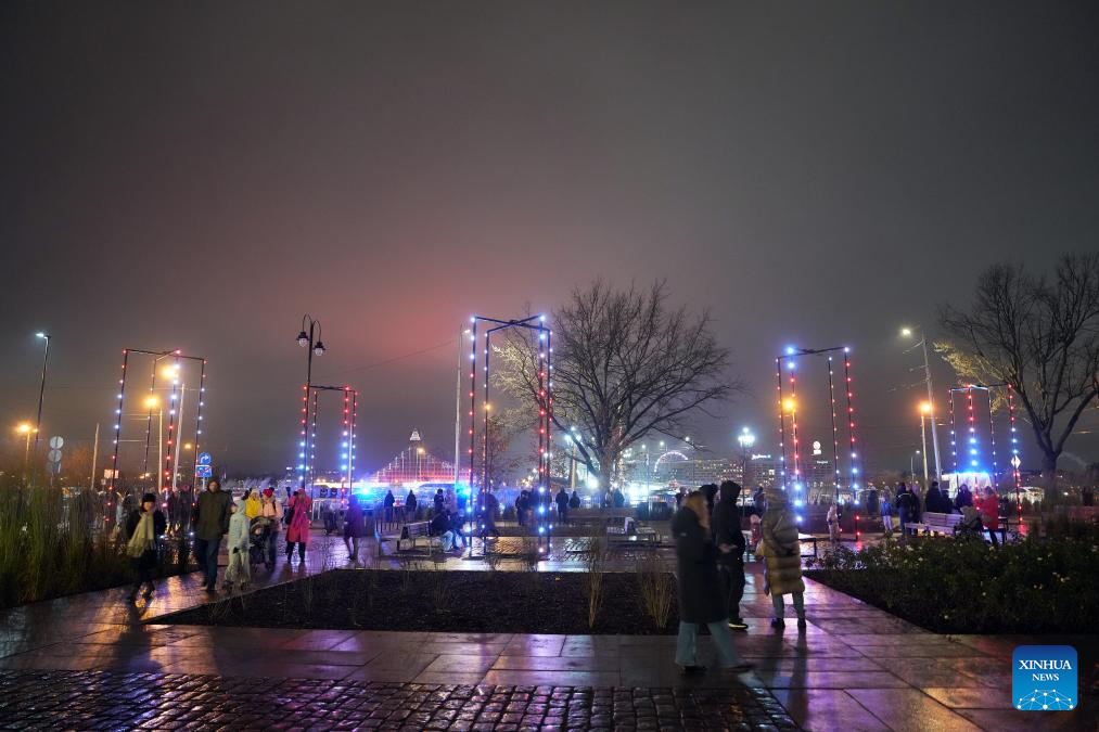 People view a light show at the Rifleman square during the light festival Staro Riga 2025 in Riga, Latvia, Nov. 17, 2025. (Photo by Edijs Palens/Xinhua)