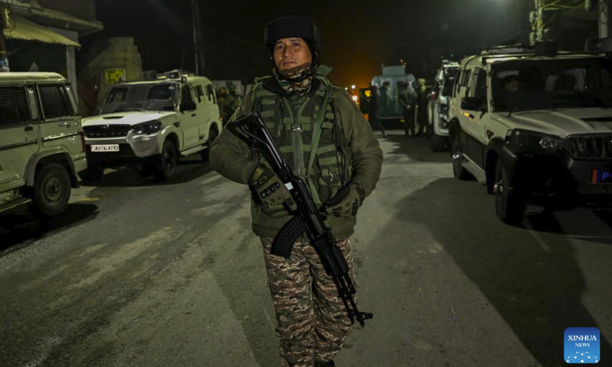 An Indian paramilitary trooper stands guard near the site of an explosion inside Nowgam police station in Srinagar, the summer capital of Indian-controlled Kashmir, Nov. 15, 2025. (Xinhua/Javed Dar)