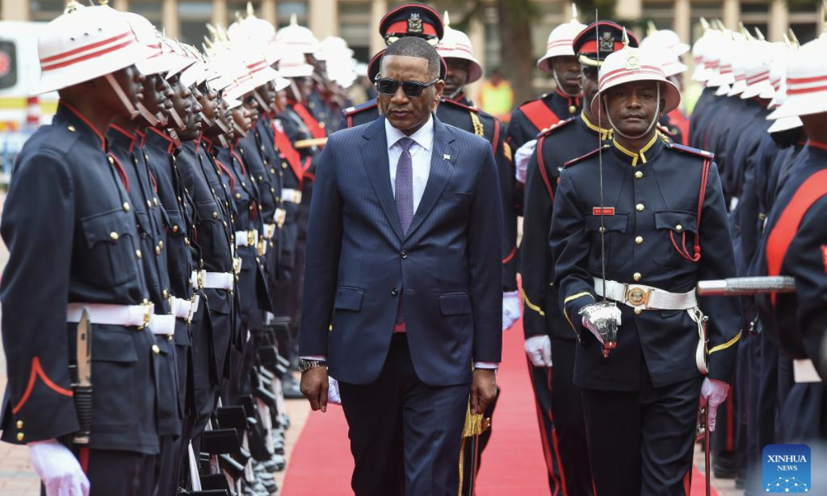 Botswana's President Duma Boko (C) inspects the guard of honor before delivering this year's State of the Nation Address in Gaborone, Botswana, on Nov. 10, 2025. (Photo by Tshekiso Tebalo/Xinhua)