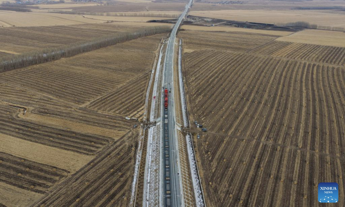 An aerial drone photo taken on Nov. 25, 2025 shows a construction site of the Harbin-Yichun high-speed railway in Qing'an County, northeast China's Heilongjiang Province. Track-laying for the Harbin-Yichun high-speed railway completed on Tuesday. The Harbin-Yichun high-speed railway is China's northernmost high-speed railway under construction. (Xinhua/Wang Song)