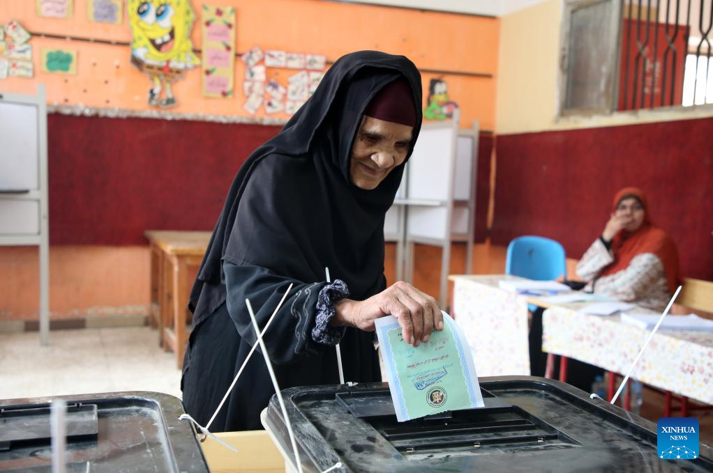 An old lady casts a vote at a polling station during the first phase of House of Representatives elections in Giza, Egypt, Nov. 10, 2025. Voting began on Monday in the first phase of Egypt's 2025 House of Representatives elections, which will last till Tuesday. (Photo by Mohamed Asad/Xinhua)