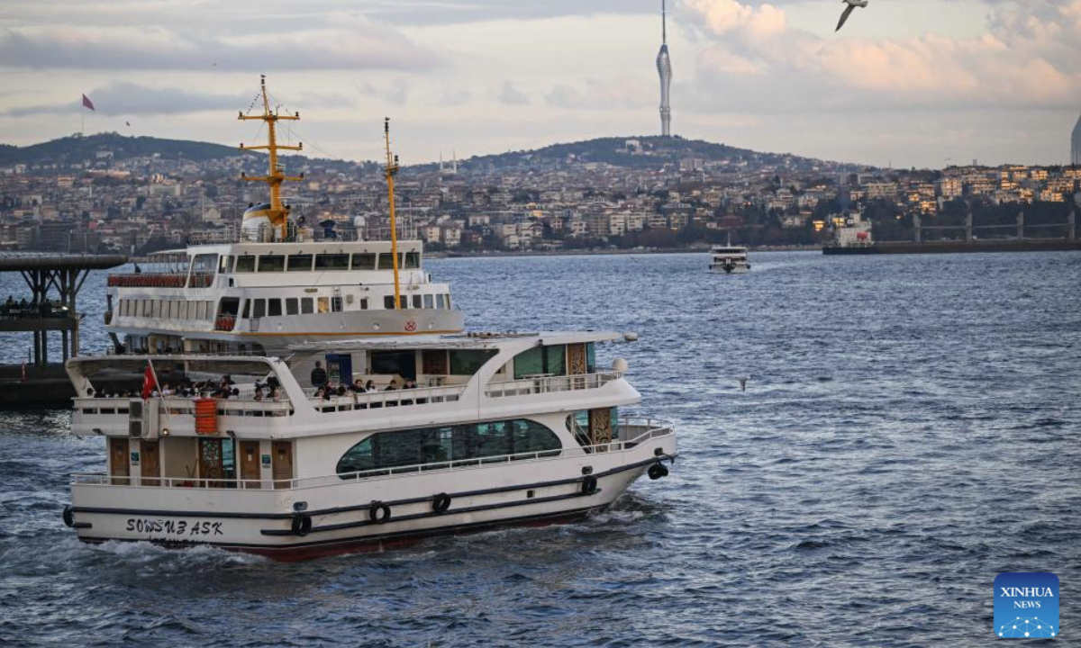 Boats sail at the entrance of the Golden Horn in Istanbul, Türkiye, Nov. 24, 2025. Located on the European side of Istanbul, the Golden Horn is one of the city's busiest natural harbors. (Xinhua/Liu Lei)