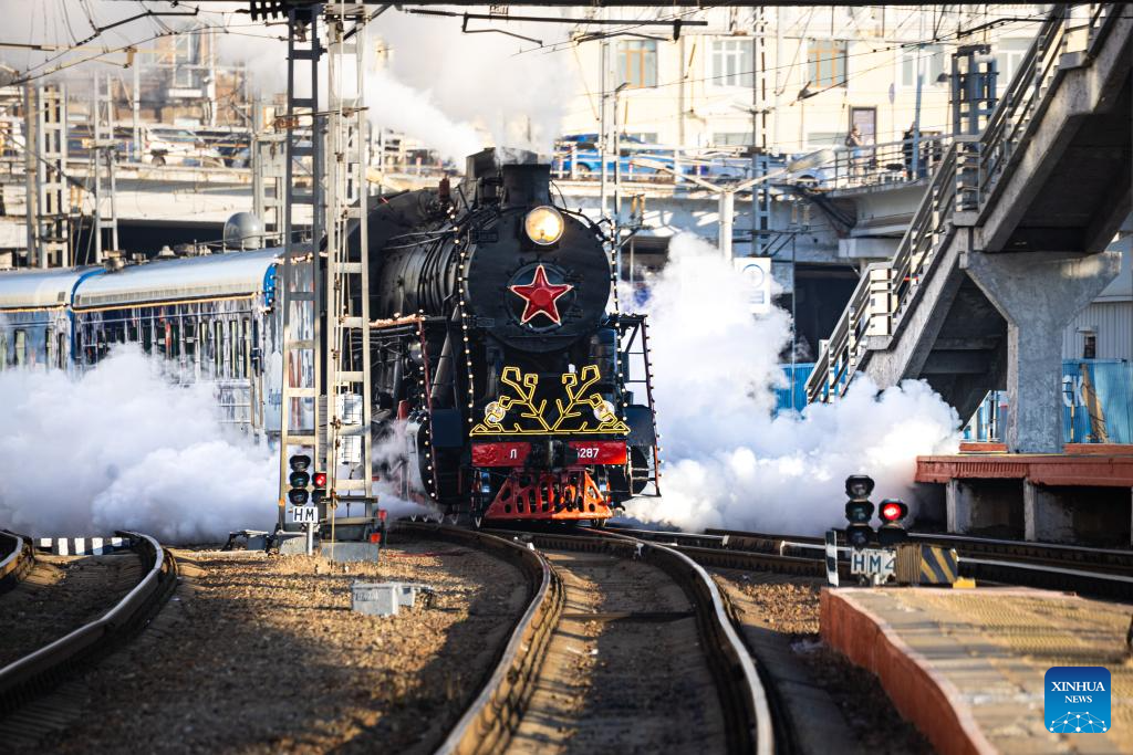 This photo taken on Nov. 19, 2025 shows the Russian Father Frost train at the Vladivostok Railway Station in Vladivostok, Russia. To celebrate Christmas and the New Year, the Father Frost train departed from Vladivostok on Nov. 19, embarking on a tour across Russia. The train will pass through approximately 70 cities in Russia, eventually arriving in Veliky Ustyugh, the hometown of Father Frost. (Photo by Andrey Matveenko/Xinhua)