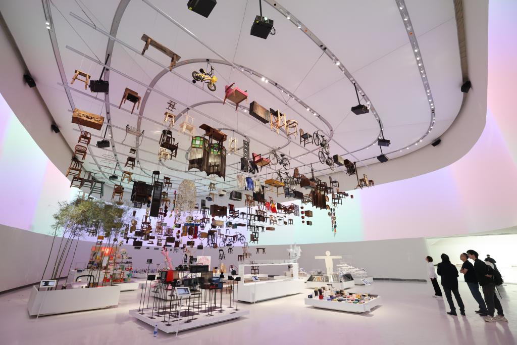 People visit an exhibition at Shenzhen Bay Culture Square in Shenzhen, south China's Guangdong Province, Nov. 1, 2025. The Shenzhen Bay Culture Square began trial operation on Saturday. The landmark square, with a construction area of 188,000 square meters, has nine exhibition halls. (Photo: Xinhua)