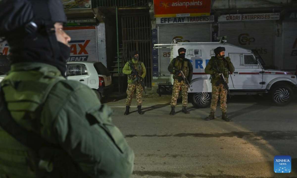 Indian paramilitary troopers stand guard near the site of an explosion inside Nowgam police station in Srinagar, the summer capital of Indian-controlled Kashmir, Nov. 15, 2025. (Xinhua/Javed Dar)