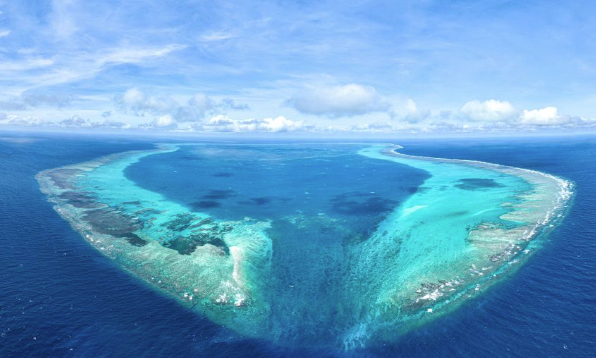 An aerial drone photo taken on Nov. 14, 2025 shows a panoramic view of China's Huangyan Dao in the South China Sea. Huangyan Dao is part of China's Zhongsha Qundao with diverse natural ecosystem. (Xinhua/Bei He)