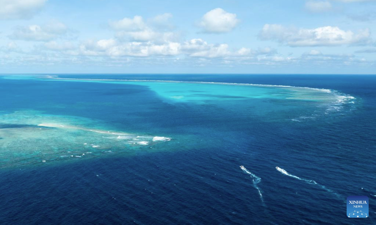 An aerial drone photo shows the China Coast Guard (CCG) conducting law enforcement patrols in the territorial waters of China's Huangyan Dao and surrounding areas on Nov. 14, 2025. (Xinhua/Bei He)
