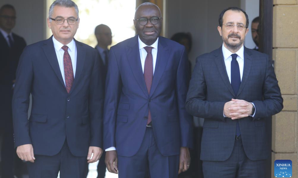 Turkish Cypriot leader Tufan Erhurman (L), Special Representative of the Secretary-General and Head of the United Nations Peacekeeping Force in Cyprus Khassim Diagne (C), and Cyprus President Nikos Christodoulides pose for a photo in Nicosia, Cyprus, Nov. 20, 2025. The leaders of the Greek Cypriot and Turkish Cypriot communities on Thursday agreed to work toward reviving long-stalled reunification talks, the United Nations Peacekeeping Force in Cyprus (UNFICYP) said.
