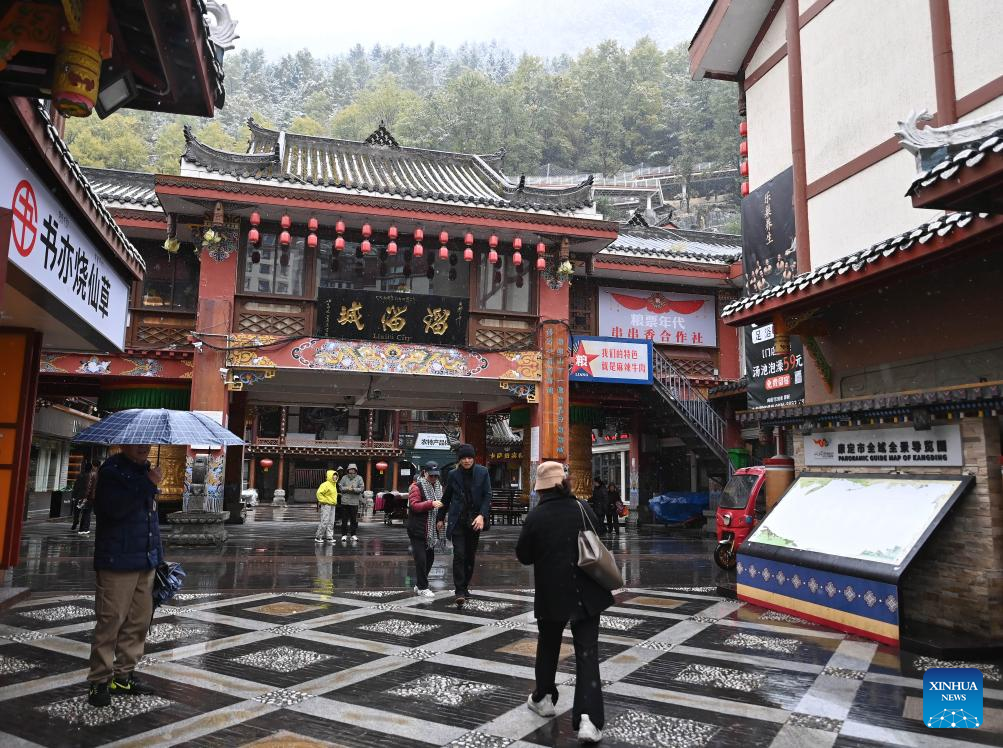 People visit a scenic spot in Kangding City, Ganzi Tibetan Autonomous Prefecture, southwest China's Sichuan Province, Nov. 1, 2025. In recent years, Ganzi Tibetan Autonomous Prefecture has leveraged its natural scenic advantages to develop its cultural and tourism industry. From January to October this year, the prefecture has received over 40 million tourist trips, setting a new record for the same period. (Xinhua/Xiao Xiao)