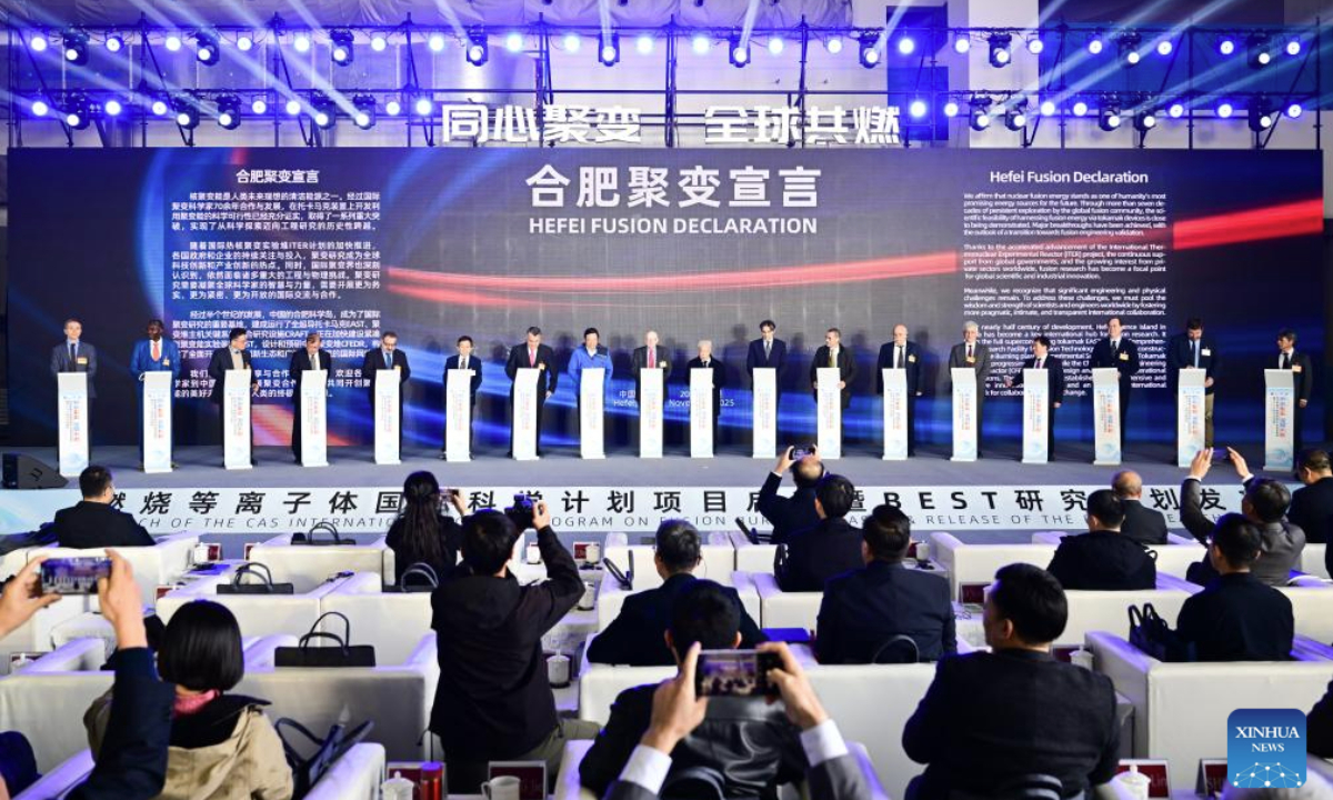 Fusion scientists from more than 10 countries sign the Hefei Fusion Declaration during the launch of the CAS International Science Program on Fusion Burning Plasma and the release of the BEST Research Plan in Hefei, east China's Anhui Province, on Nov. 24, 2025. China on Monday launched an international science program focused on fusion burning plasma research in Hefei, capital of east China's Anhui Province, opening several major fusion research platforms to global scientists for joint scientific advancements. This international program, initiated by the Chinese Academy of Sciences' Institute of Plasma Physics, will provide global access to the country's multiple major fusion research platforms -- including the Burning Plasma Experimental Superconducting Tokamak (BEST) facility in Hefei. (Xinhua/Zhou Mu)