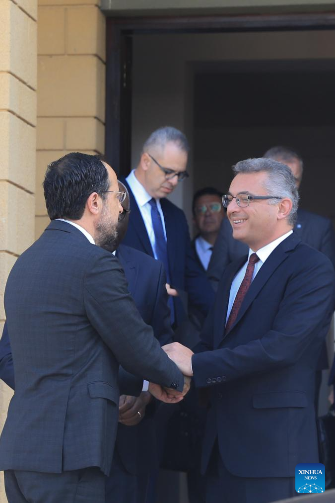 Cyprus President Nikos Christodoulides (L) shakes hands with Turkish Cypriot leader Tufan Erhurman (R) in Nicosia, Cyprus, Nov. 20, 2025. The leaders of the Greek Cypriot and Turkish Cypriot communities on Thursday agreed to work toward reviving long-stalled reunification talks, the United Nations Peacekeeping Force in Cyprus (UNFICYP) said.

The meeting brought together Nikos Christodoulides, president of the Republic of Cyprus, and Turkish Cypriot leader Tufan Erhurman for the first time since Erhurman's election in October. (Photo by George Christophorou/Xinhua)