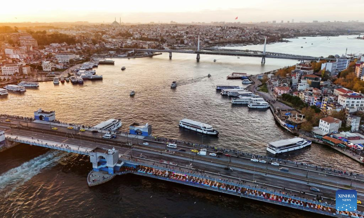 An aerial drone photo taken on Nov. 24, 2025 shows the Golden Horn at sunset in Istanbul, Türkiye. Located on the European side of Istanbul, the Golden Horn is one of the city's busiest natural harbors. (Xinhua/Liu Lei)