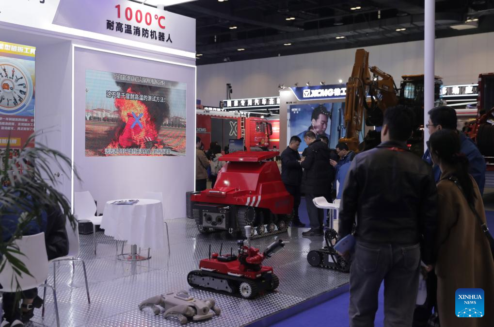 People visit the China International Emergency Management Exhibition (CIEME) at the China National Convention Center in Beijing, capital of China, Nov. 18, 2025. Kicked off here on Tuesday, the 3-day event boasted an exhibition area of about 40,000 square meters, with more than 300 exhibitors participating. (Xinhua/Guo Yu)