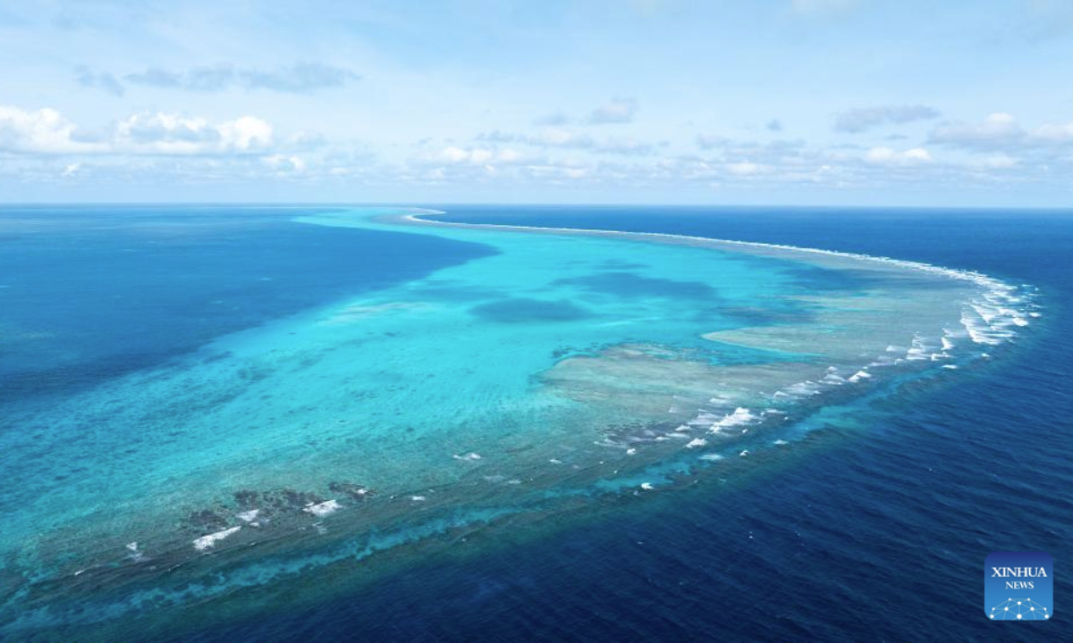 An aerial drone photo taken on Nov. 14, 2025 shows a panoramic view of China's Huangyan Dao in the South China Sea. Huangyan Dao is part of China's Zhongsha Qundao with diverse natural ecosystem. (Xinhua/Bei He)