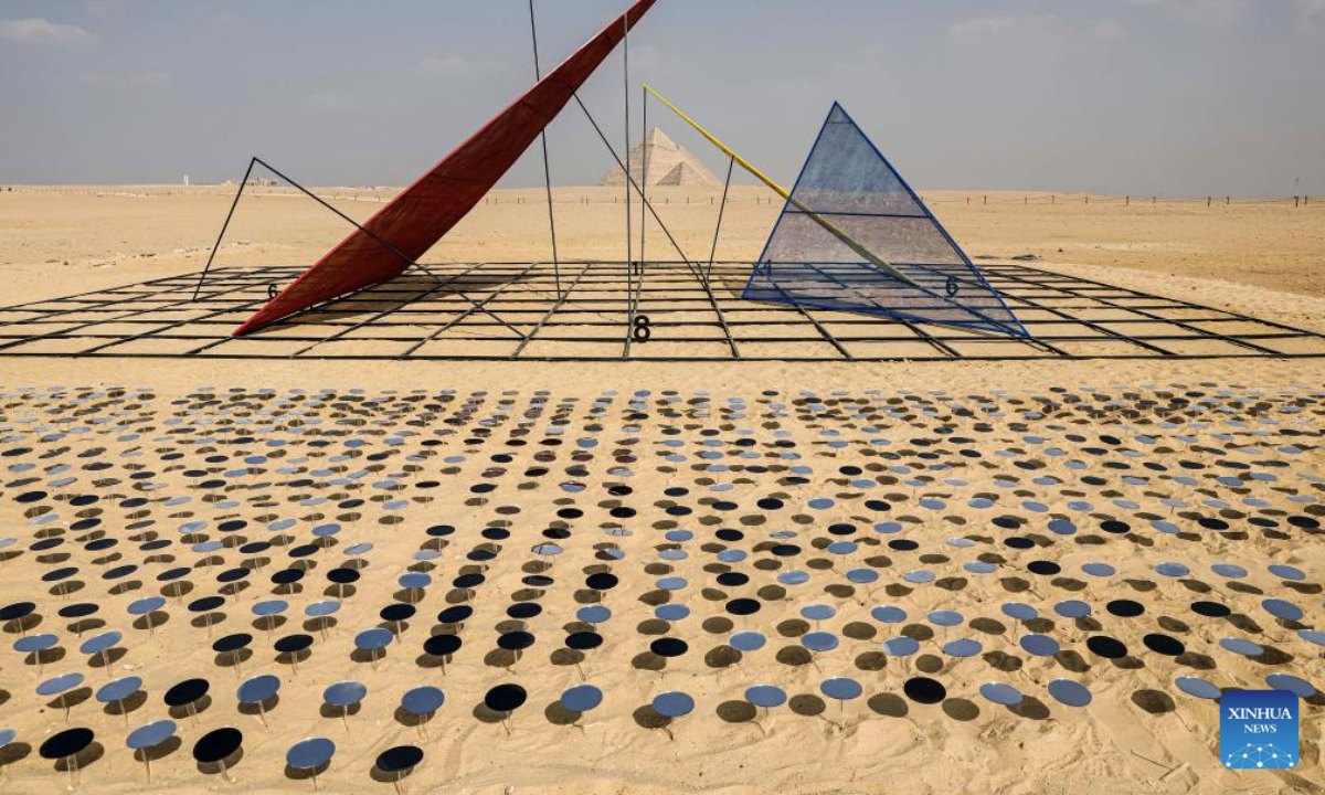 An artistic installation is displayed during the Forever Is Now international art exhibition at Giza Pyramids scenic spot in Giza, Egypt, Nov. 11, 2025. The fifth edition of Forever Is Now international art exhibition on Tuesday kicked off in the area of Egypt's Giza Pyramids scenic spot, showcasing 10 artworks of artists from different countries. The exhibition runs from Nov. 11 to Dec. 6. (Xinhua/Ahmed Gomaa)