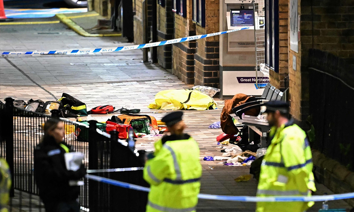 Paramedics' medical equipment is pictured inside a police cordon outside Huntingdon Station in Huntingdon, eastern England, on November 1, 2025, following a stabbing on a train. Photo: VCG