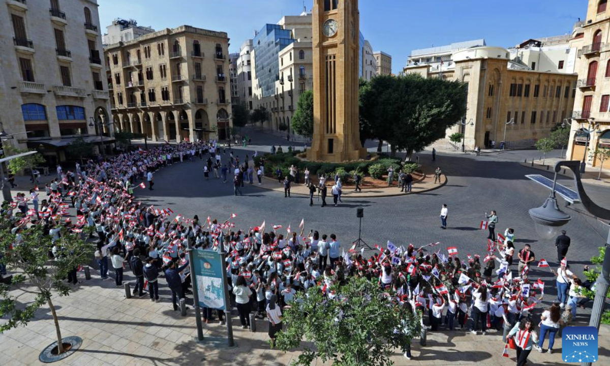 People participate in a celebration event for Lebanon's upcoming Independence Day in downtown Beirut, Lebanon, Nov. 20, 2025. Lebanon's Independence Day falls on Nov. 22. (Xinhua/Bilal Jawich)