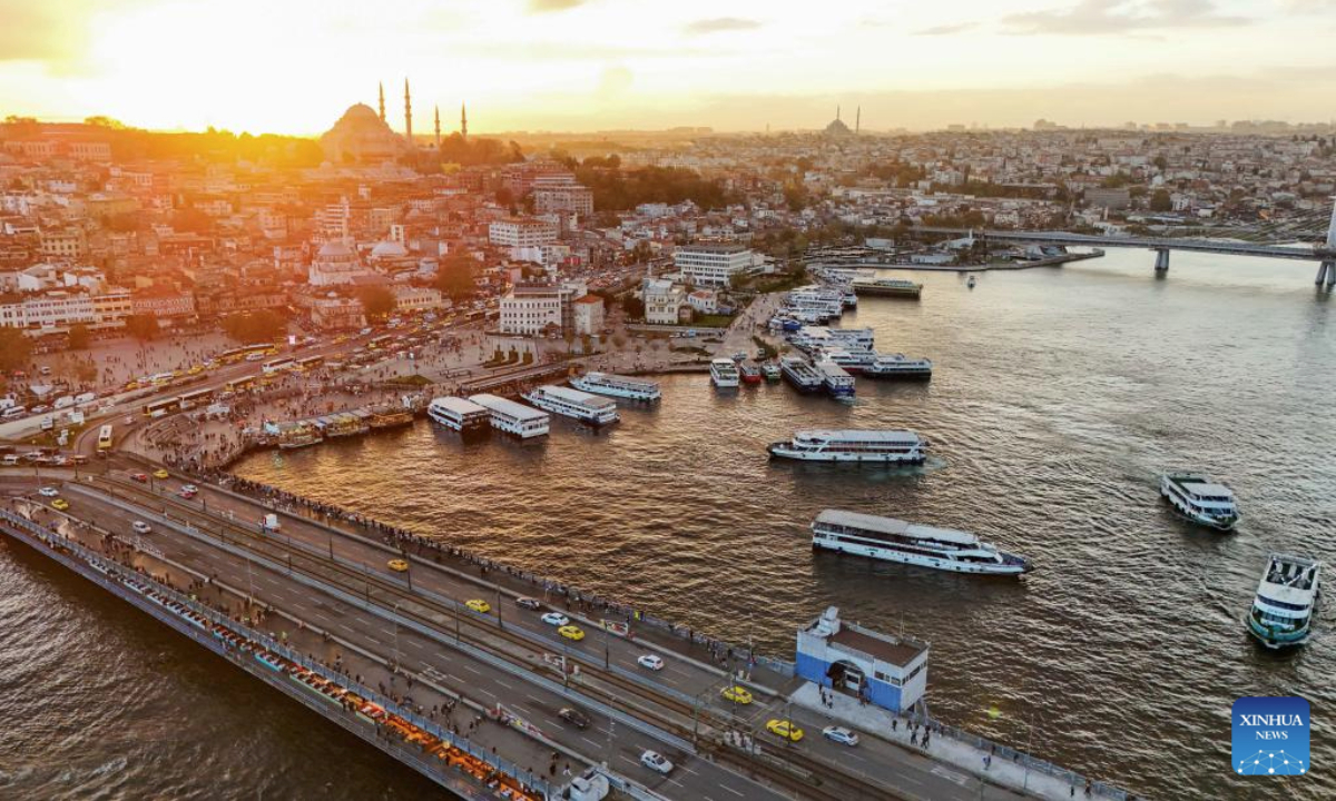 An aerial drone photo taken on Nov. 24, 2025 shows the Golden Horn at sunset in Istanbul, Türkiye. Located on the European side of Istanbul, the Golden Horn is one of the city's busiest natural harbors. (Xinhua/Liu Lei)