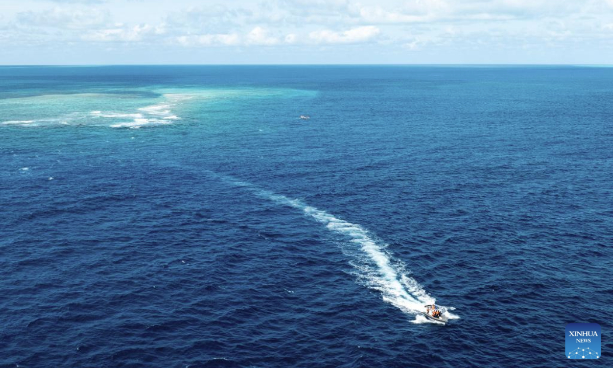 An aerial drone photo shows the China Coast Guard (CCG) conducting law enforcement patrols in the territorial waters of China's Huangyan Dao and surrounding areas on Nov. 14, 2025. (Xinhua/Bei He)