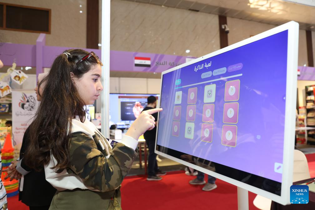 A girl participates in Iraq International Children's Festival in Baghdad, Iraq, Nov. 19, 2025. The forth edition of the Iraq International Children's Festival kicked off on Wednesday and will last 10 days. (Xinhua/Khalil Dawood)