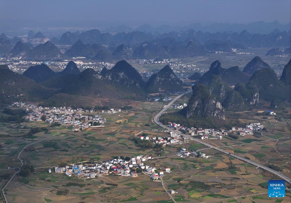 An aerial drone photo taken on March 20, 2025 shows the Jueshan Village of Sandu Town, Liuzhou City, south China's Guangxi Zhuang Autonomous Region. (Photo: Xinhua)