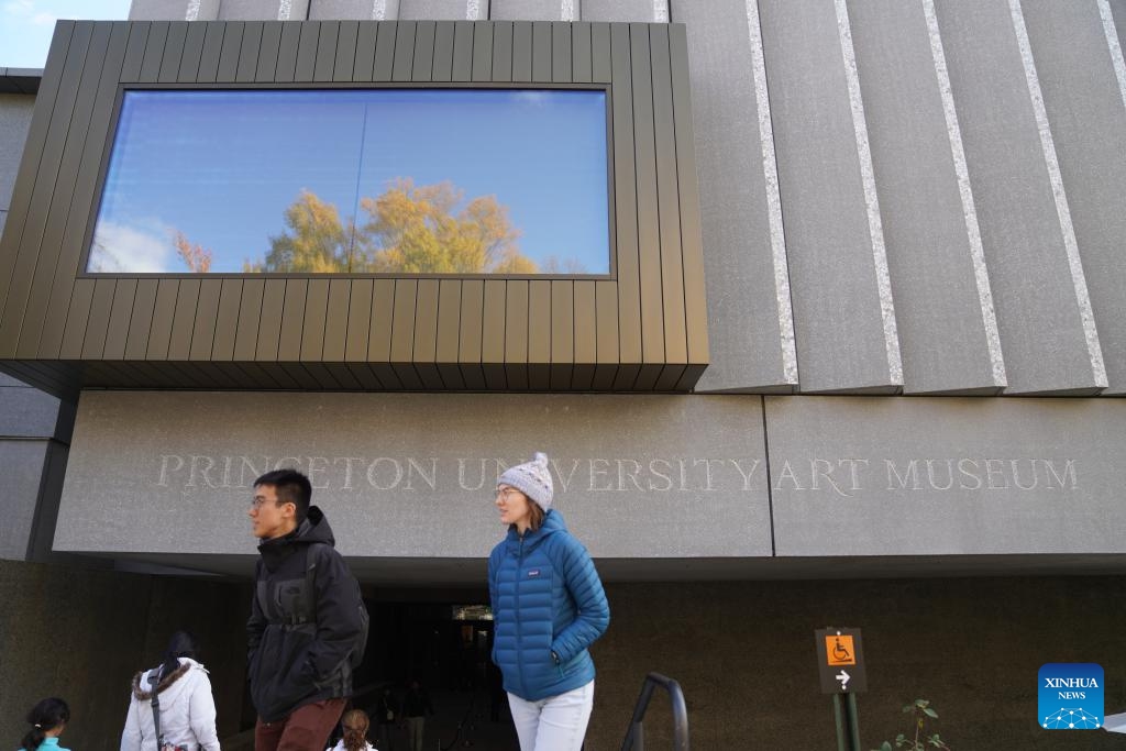 People are seen in front of the new Princeton University Art Museum in New Jersey, the United States, on Nov. 1, 2025. After 13 years of design and construction, the new art museum of Princeton University reopened its doors to the general public with a 24-hour party from 5 p.m. Oct. 31, to 5 p.m. Nov. 1. (Photo: Xinhua)