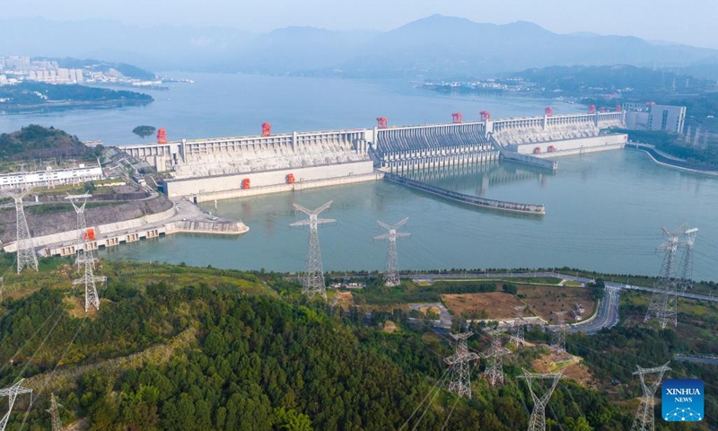 An aerial drone photo taken on Nov. 2, 2025 shows the Three Gorges Dam and its outbound power transmission lines in Yichang, central China's Hubei Province. The Three Gorges project, the world's largest hydropower project, has generated over 423 billion kWh of electricity since it was officially certified as complete and fully functioning on Nov. 1, 2020. (Photo: Xinhua)