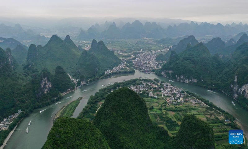 An aerial drone photo taken on April 25, 2021 shows a view of the Xingping Town in Yangshuo County of Guilin, south China's Guangxi Zhuang Autonomous Region. (Photo: Xinhua)