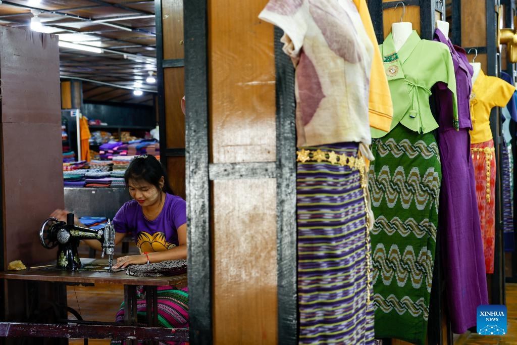 A woman works at a hand-weaving workshop on Inle Lake in Nyaungshwe township, Shan state, Myanmar, Oct. 31, 2025. (Photo: Xinhua)