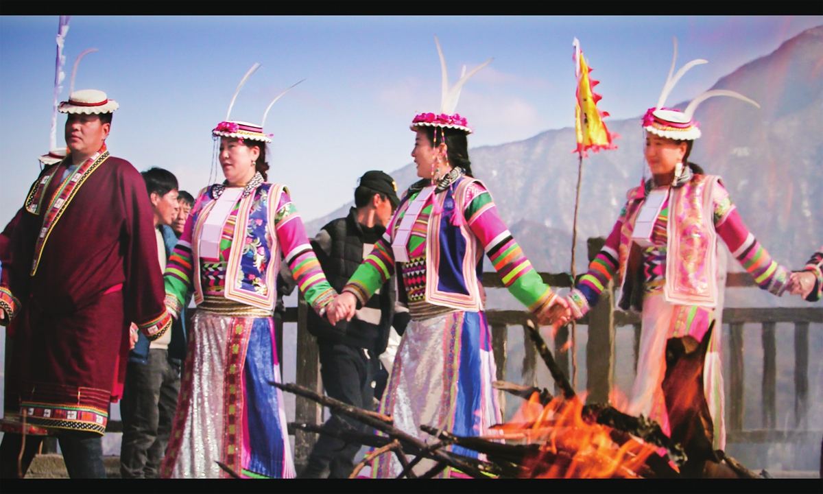 Baima people perform their iconic 